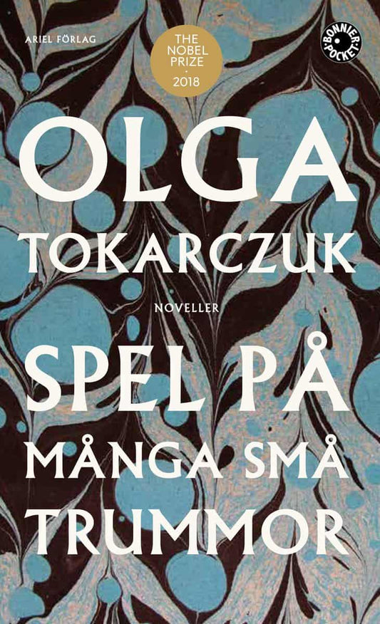 Tokarczuk, Olga | Spel på många små trummor