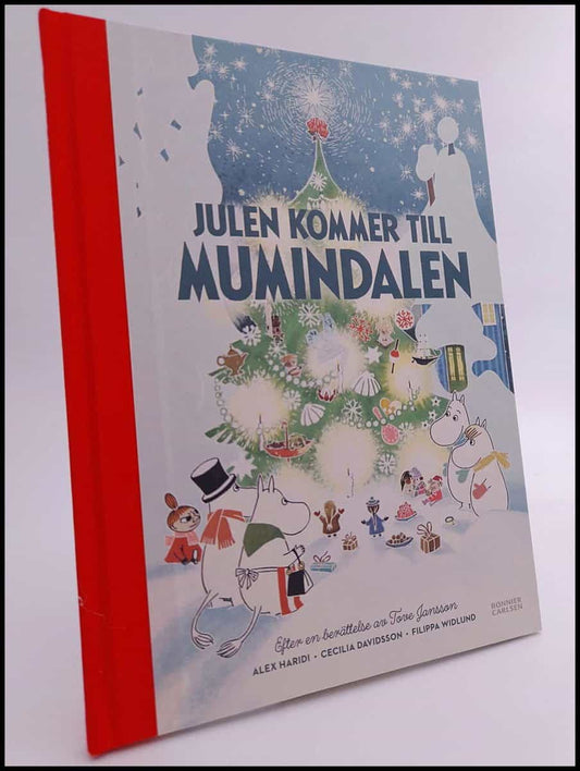 Haridi, Alex | Julen kommer till Mumindalen : Efter en berättelse av Tove Jansson