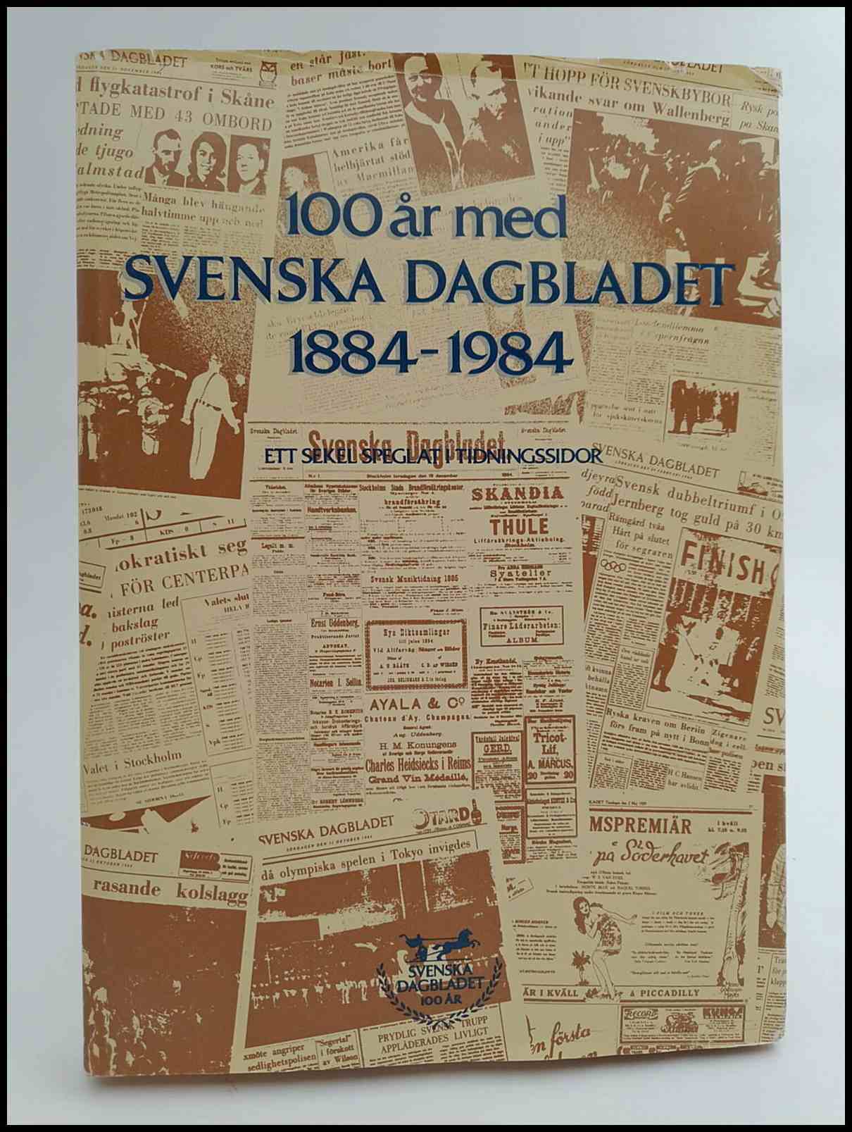 Lagerstedt, Lars [red.] | 100 år med Svenska Dagbladet 1884-1984 : Ett sekel speglat i tidningssidor