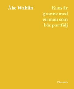 Wahlin, Åke | Kaos är granne med en man som bär portfölj