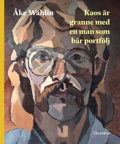 Wahlin, Åke | Kaos är granne med en man som bär portfölj