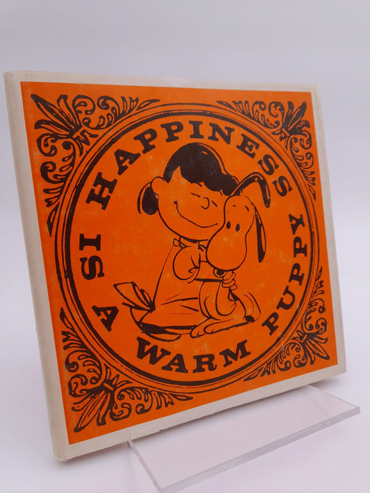 Schulz, Charles M | Happiness is a Warm Puppy